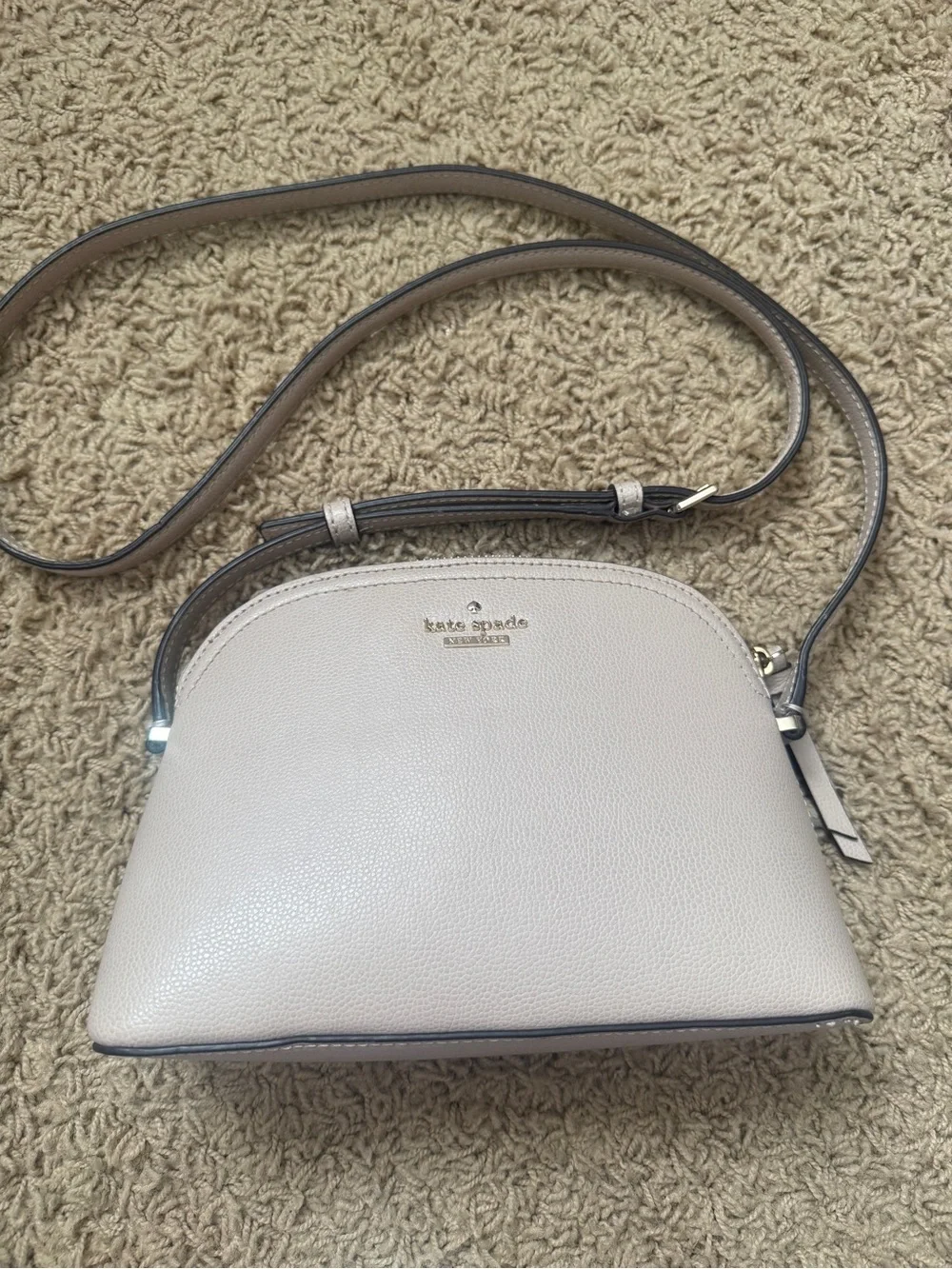 kate spade pebble leather dome crossbody in light taupe